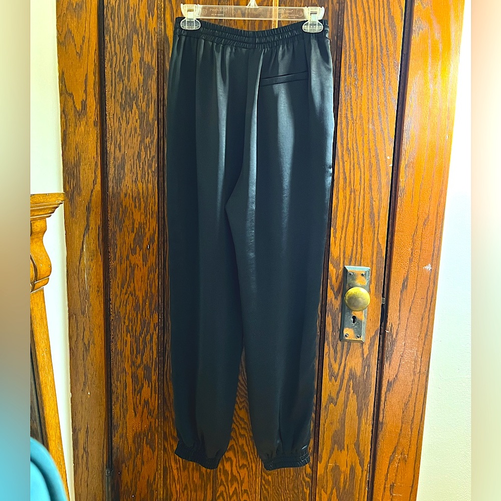 Miss Love black satin draw string joggers.  Never worn.  S